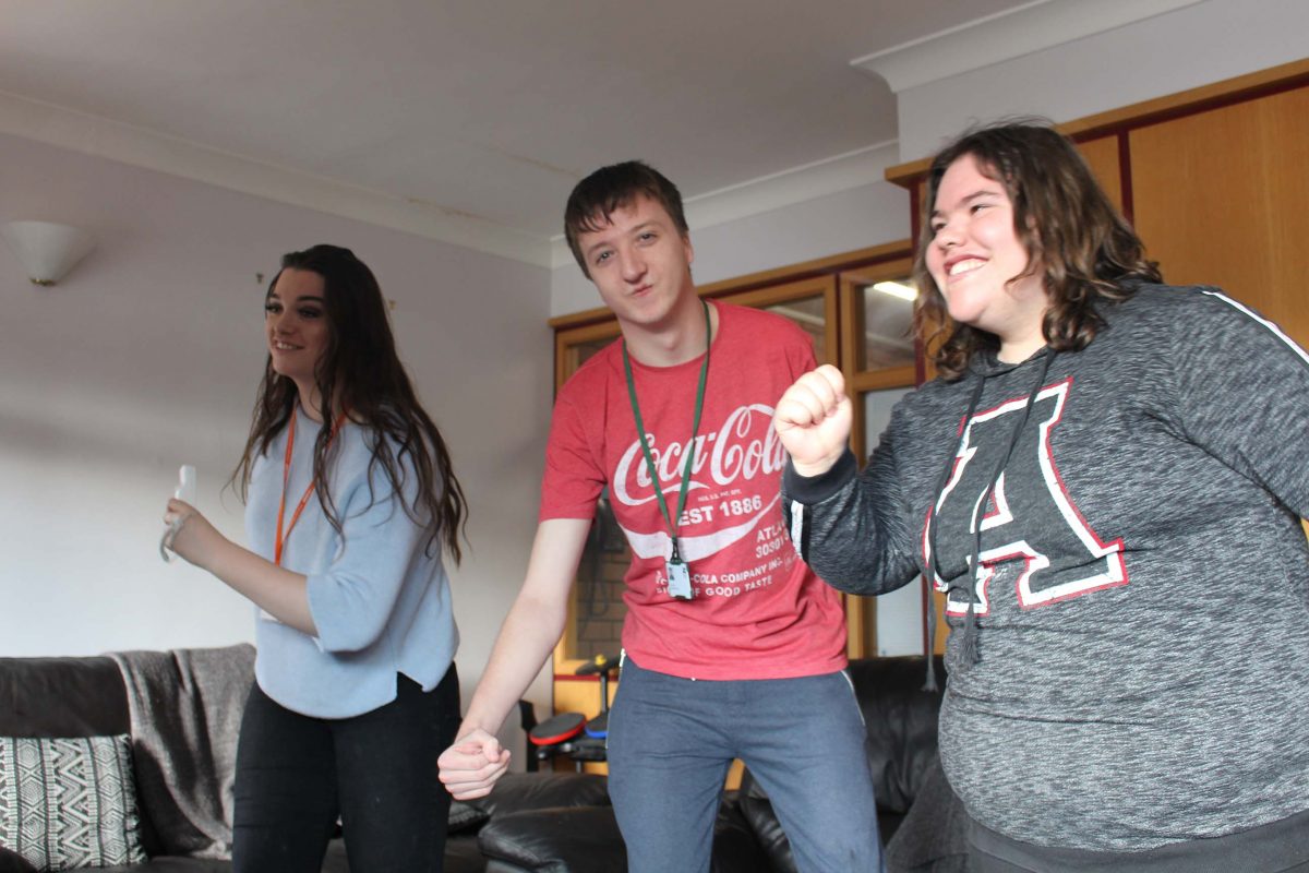 Independent Living Residents playing a video game