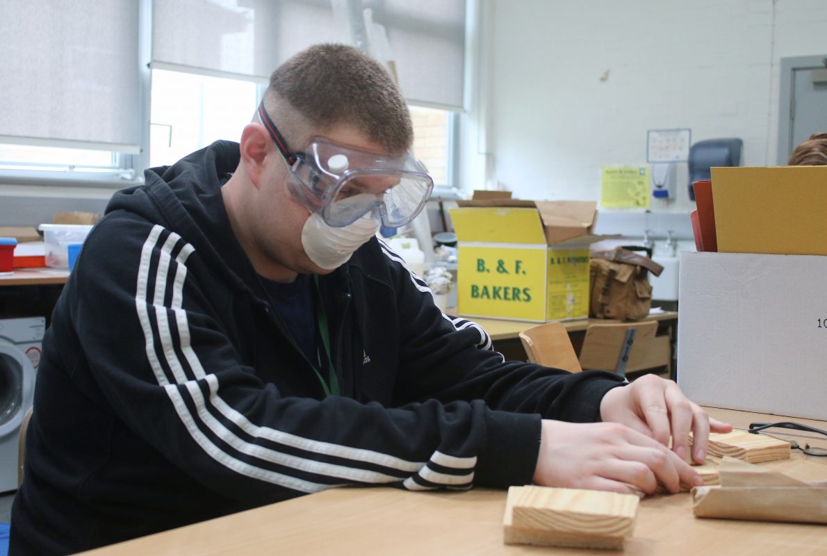 Learner in carpentry class