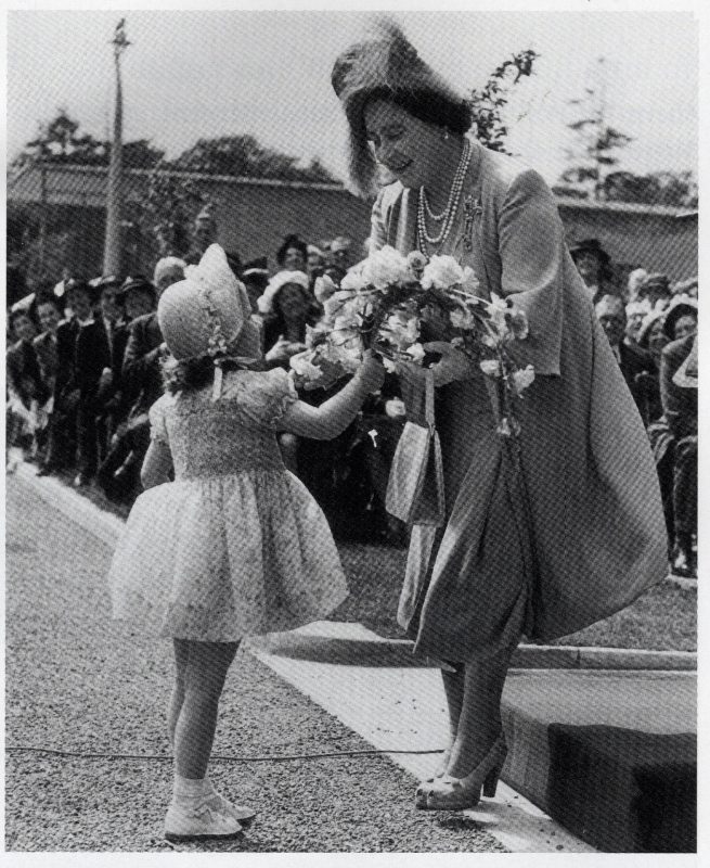 Queen Mother Receiving Gift at Opening Ceremony