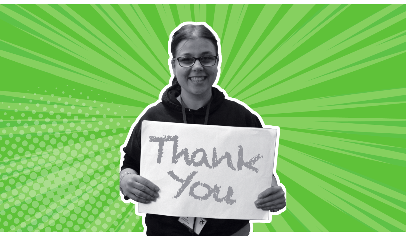 Learner holding up thank you sign