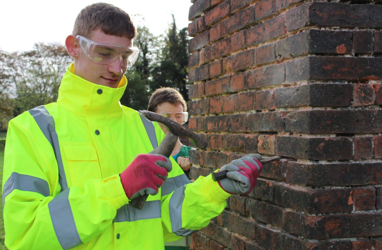 Learner restoring pillar at Wollaton Park