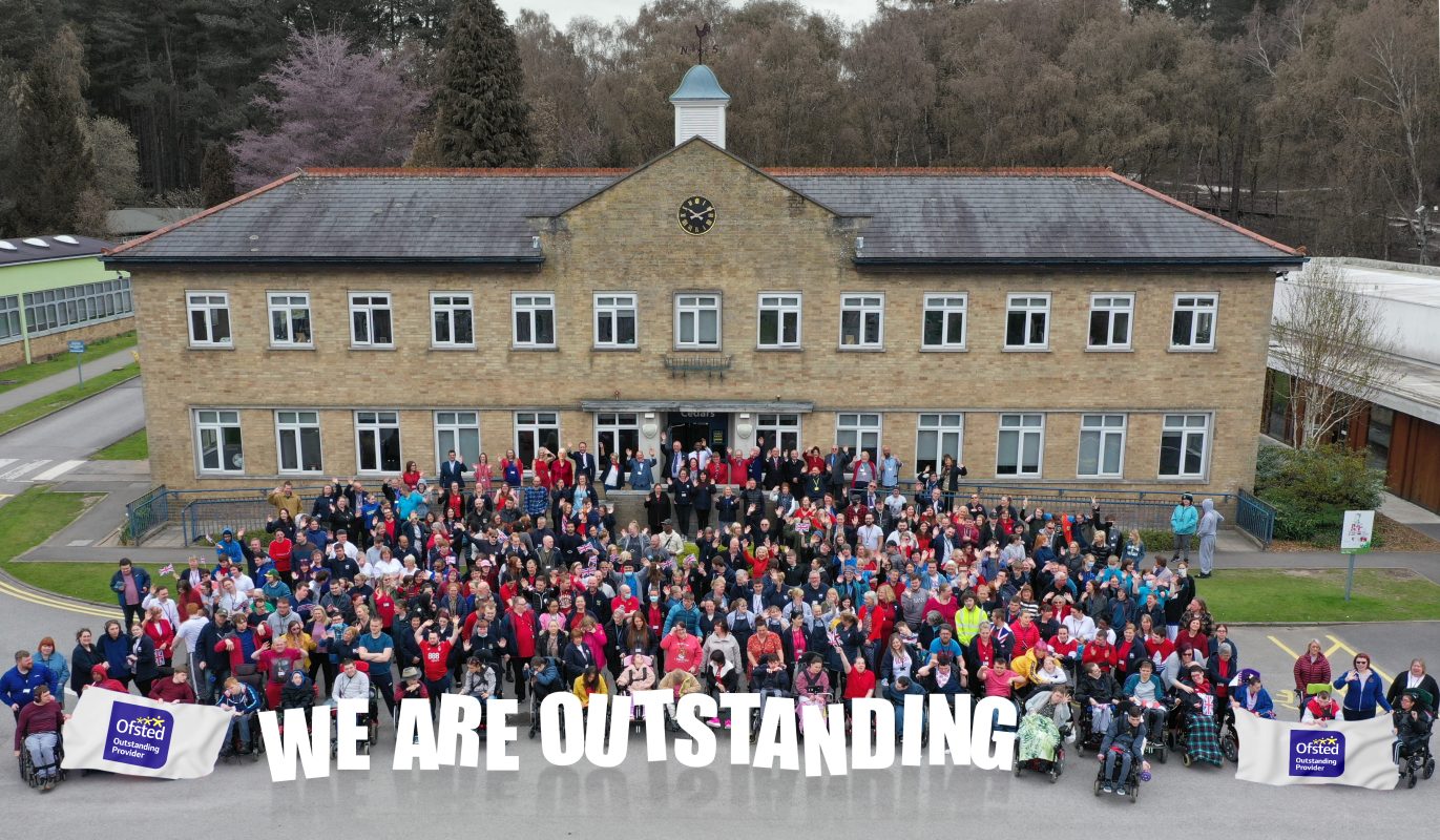 Portland learners and staff outside the quad celebrating Ofsted Outstanding result