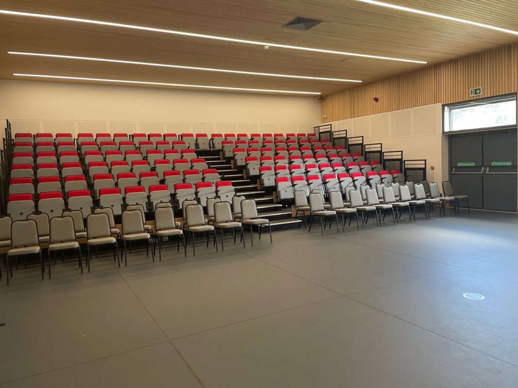 Image of a hall with bleacher seating