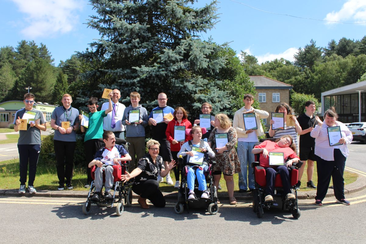 Group of Portland's learners and citizens with their awards and certificates.