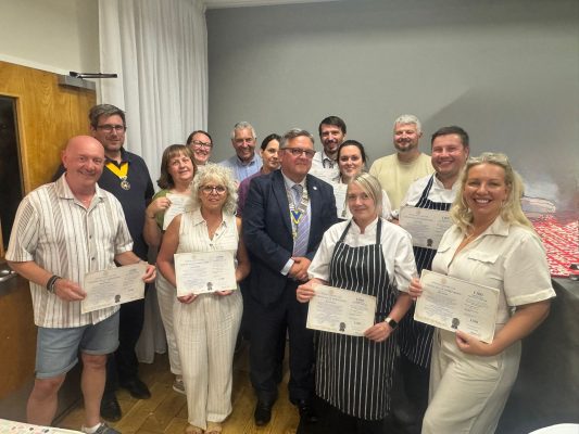 Mansfield Rotary President Wayne Swiffin, together with Rotarians Geoff Milnes and Pete Holland, with members of the Portland Functions Event Team